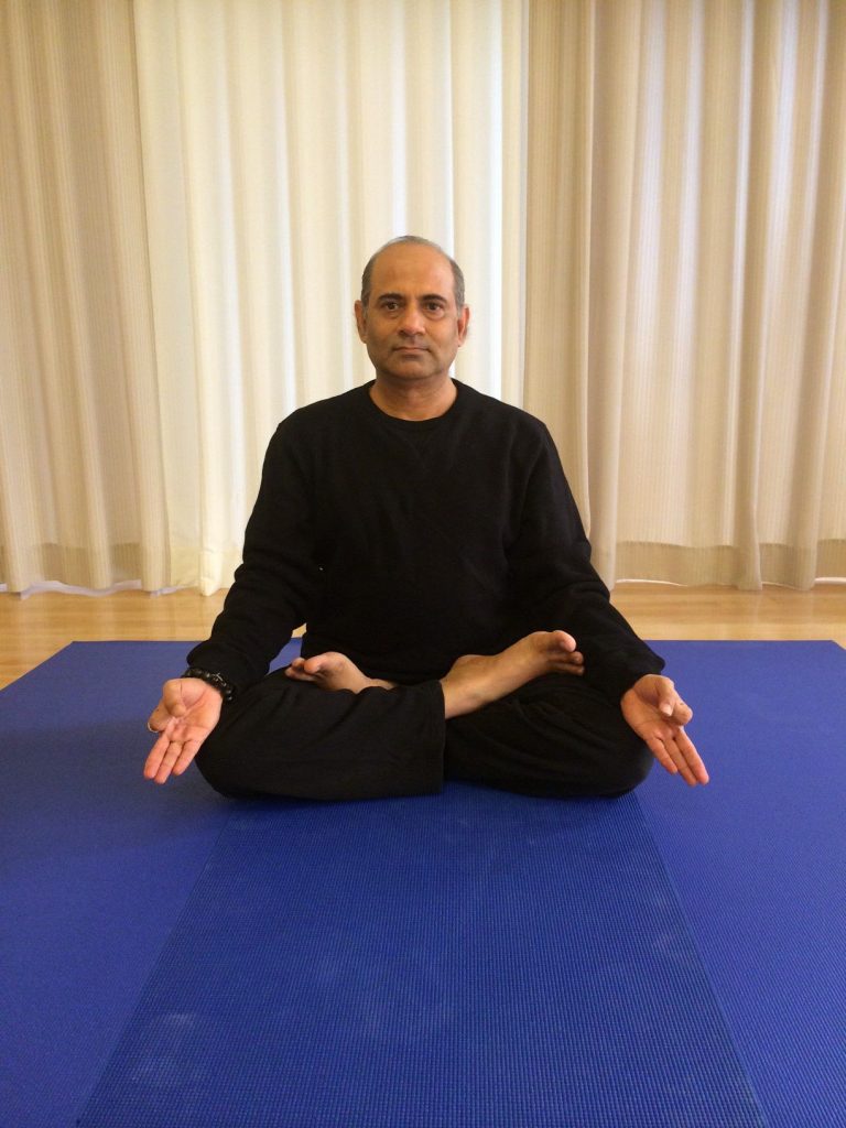 Mr. Vinod Sharma Hong Kong showing Yoga Pose 4